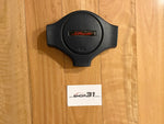NISSAN SKYLINE R31 - STEERING WHEEL HORN BUTTON