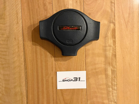 NISSAN SKYLINE R31 - STEERING WHEEL HORN BUTTON