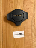 NISSAN SKYLINE R31 - 'SKYLINE' STEERING WHEEL HORN BUTTON